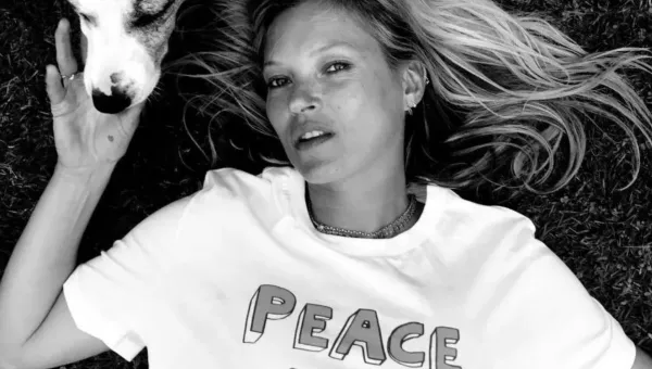 Kate Moss wears War Child's Peace & Love T-Shirt made in collaboration with designer and brand partner, Bella Freud.