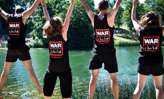 Team War Child supporters celebrate in their War Child tops