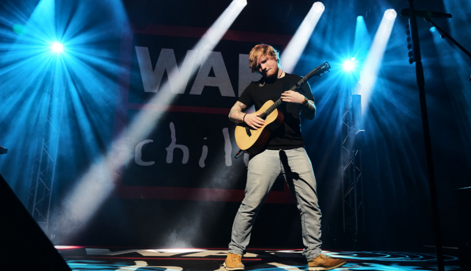 Ed Sheeran playing a live show for BRITs Week.