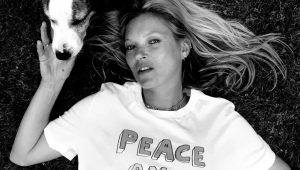 Kate Moss wears War Child's Peace & Love T-Shirt made in collaboration with designer Bella Freud.