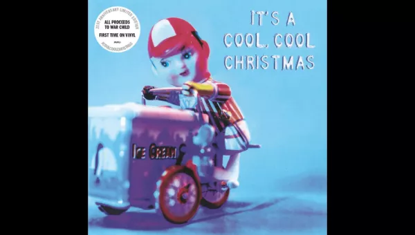 Its a cool cool christmas cover - toy ice cream man toy in a blue background