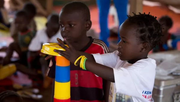 Children play with building blocks in an early childhood development centre in the Central African Republic.