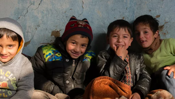 Children in Afghanistan smile at one of War Child's centres.