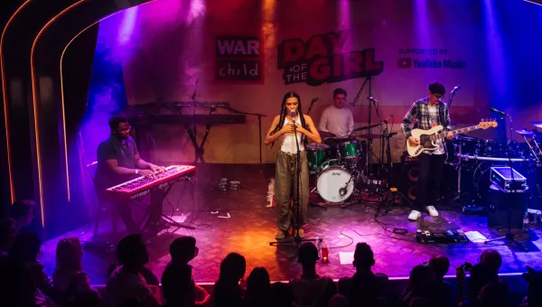  Olivia Dean performs at War Child's Day Of The Girl Event in 2021 supported by YouTube Music.