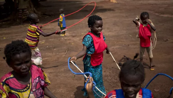 Children play with skipping ropes outside of a War Child early childhood development centre in the Central African Republic.