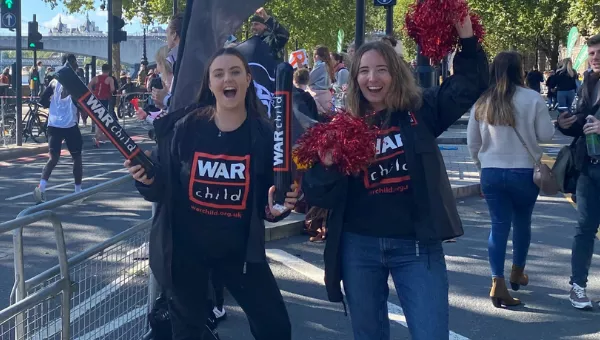 War Child staff cheer at marathon.