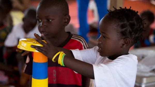 Children playing with building blocks in the Central African Republic.