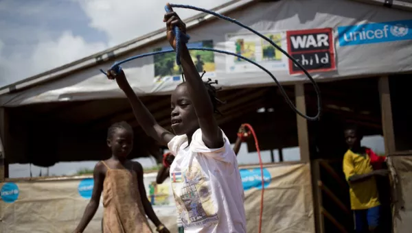 A child skipping. 