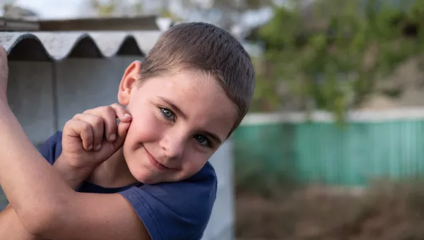 Young boy smiling in Moldova, Ukraine.