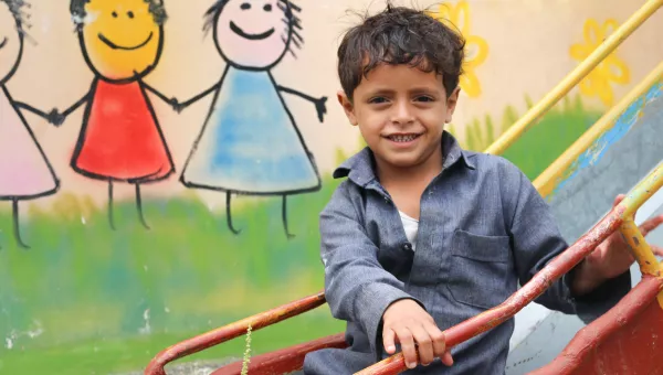 Boy playing in playground