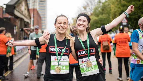 Two people running a race