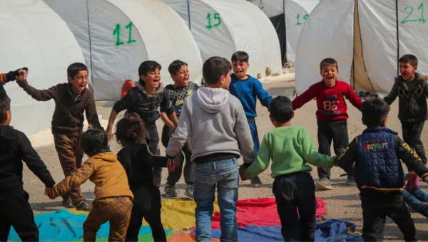 Children playing in a refugee camp in Syria. 