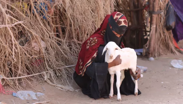 Hayat and her goat.