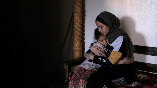 Mother and daughter hugging. 