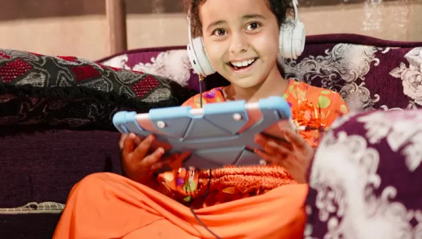Can't Wait to Learn games being introduced to out-of-school Syrian refugees in informal tented settlements.