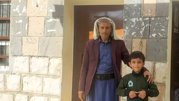 Salem and Saeed standing together.