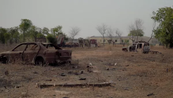 Two destroyed cars in South Sudan.