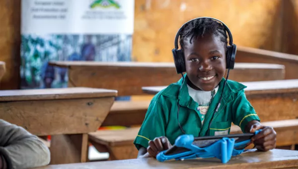 A child using Can't Wait to Learn in Uganda. 