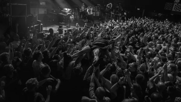 The crowd at one of the Friendly Records fundraising events.