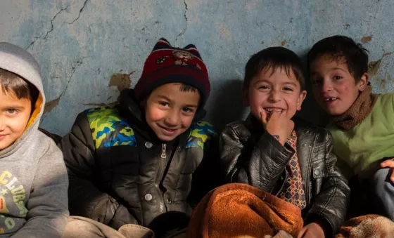 Children in Afghanistan smile at one of War Child's centres.