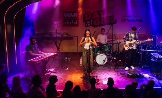 Olivia Dean performs at War Child's Day Of The Girl Event in 2021 supported by YouTube Music.