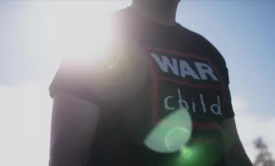 War Child runner wears a War Child T-Shirt.