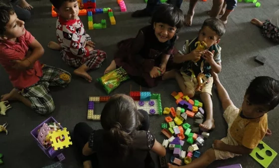 Children play with building blocks in a War Child child-friendly space in Iraq.