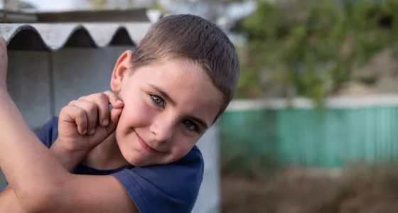 Young boy smiling in Moldova, Ukraine. 