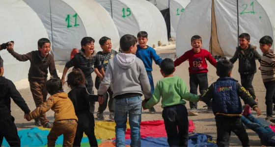 Children playing in a refugee camp in Syria. 