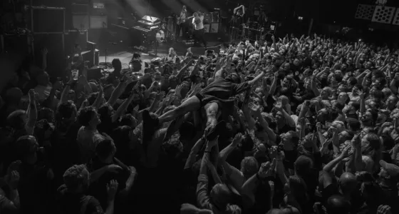 The crowd at one of the Friendly Records fundraising events.
