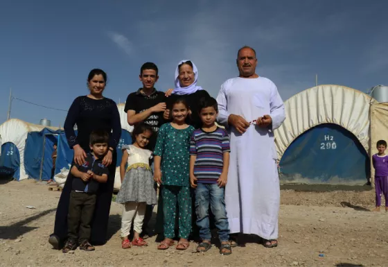 An Iraqi family in the camp they live in with other families displace by the conflict in the country.