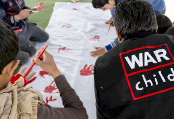 Children taking part in activities to mark Red Hand Day, also known as the International Day against the Use of Child Soldiers, where red hand prints are shared to call on world leaders to stop the use of children in armed groups.