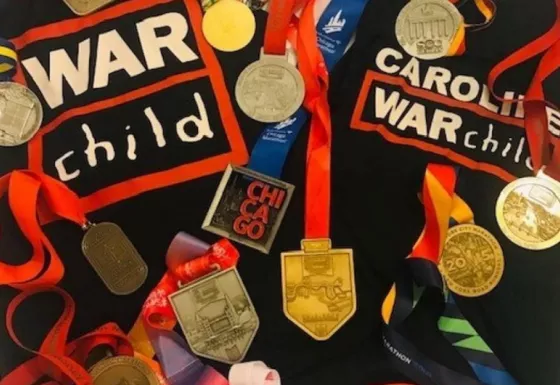 Caroline's completed an amazing 12 marathons in aid of children affected by war and she's got the medals to prove it.