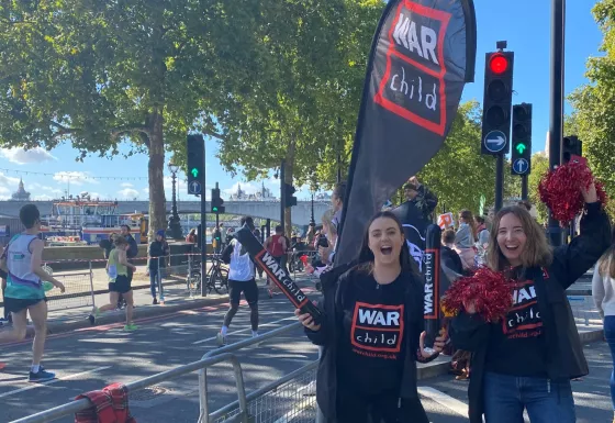 The War Child Cheer Squad cheering on runners at the 2021 London Marathon.