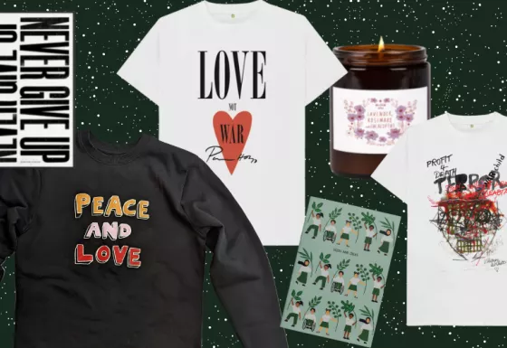 Shop For Good Gift Selection including clothing, a notebook, a print and a candle