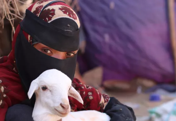 Hayat and her goat.