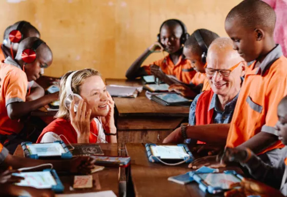 Carey Mulligan and Rob Williams with children in Uganda. 