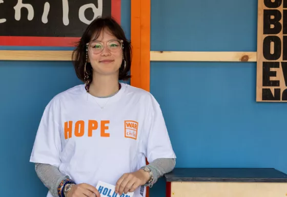 A girl wearing the Anthony Burrill t-shirt