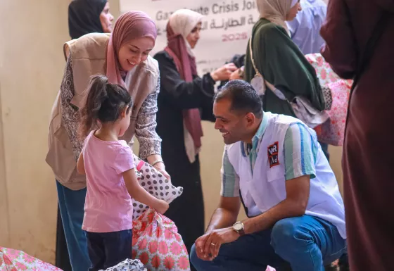 Save Youth Future Society partner distributing dignity kits to Mothers and children