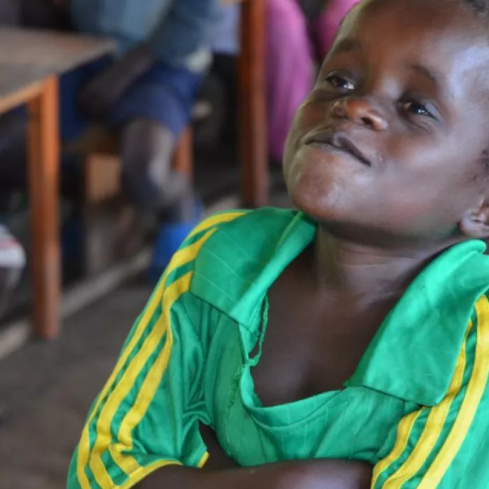 The stress of war creates challenges for children in school like this child in the Democratic Republic of Congo.