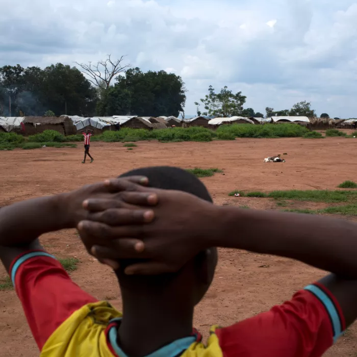 Former child soldier, Frederique playing football in the Central African Republic.