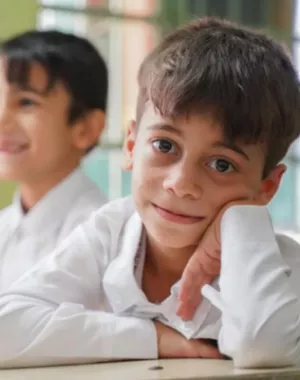 Child sitting in a classroom in Jordan.